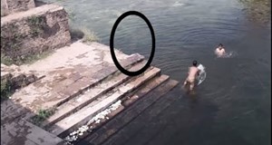 Ghost Taking a Swim in a Lake